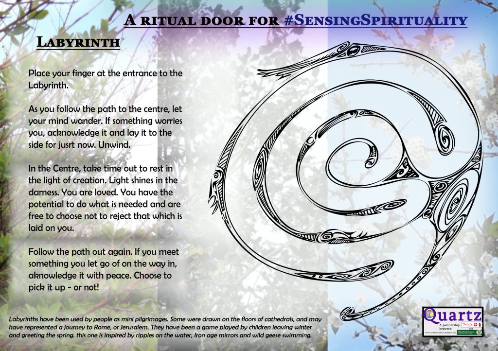 A ritual door for sensing spiritualty, with a finger labyrinth to follow on it.